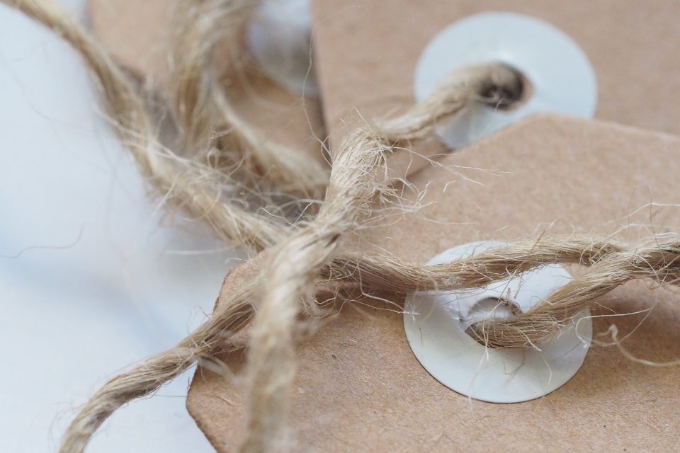 Kraft paper gift tags tied with twine